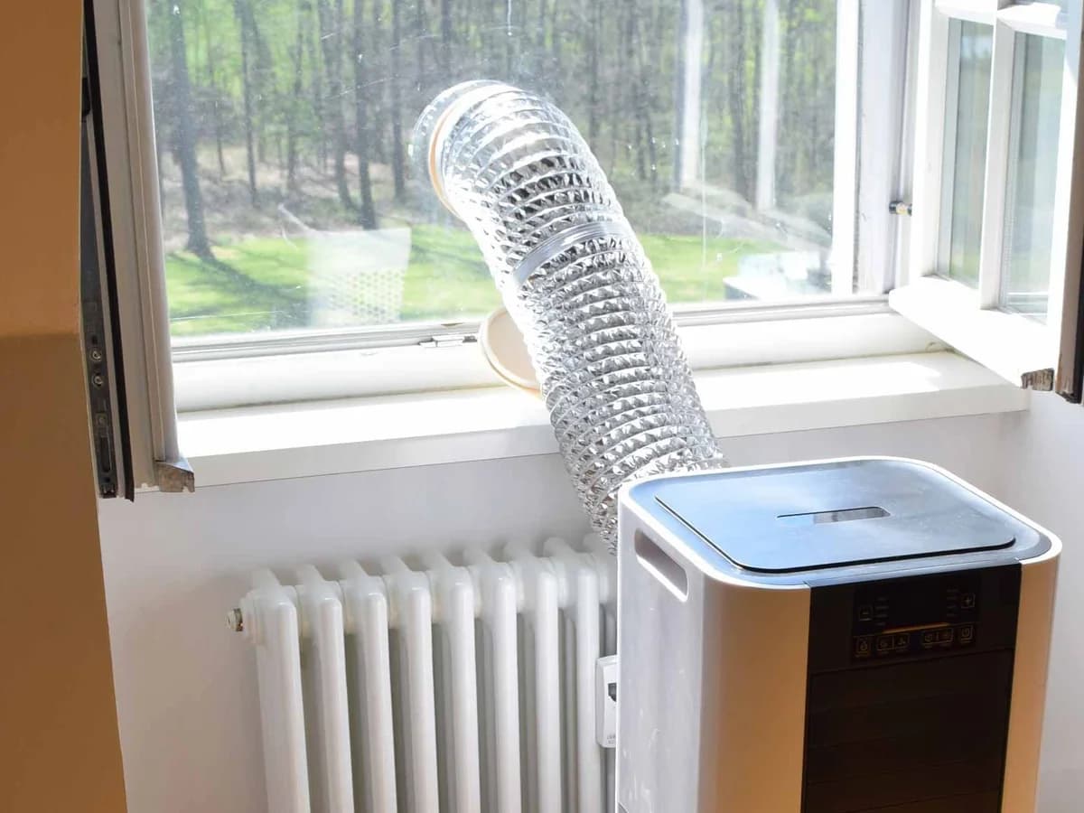 Placeholder graphic representing a portable air conditioner exhaust hose installed in a window